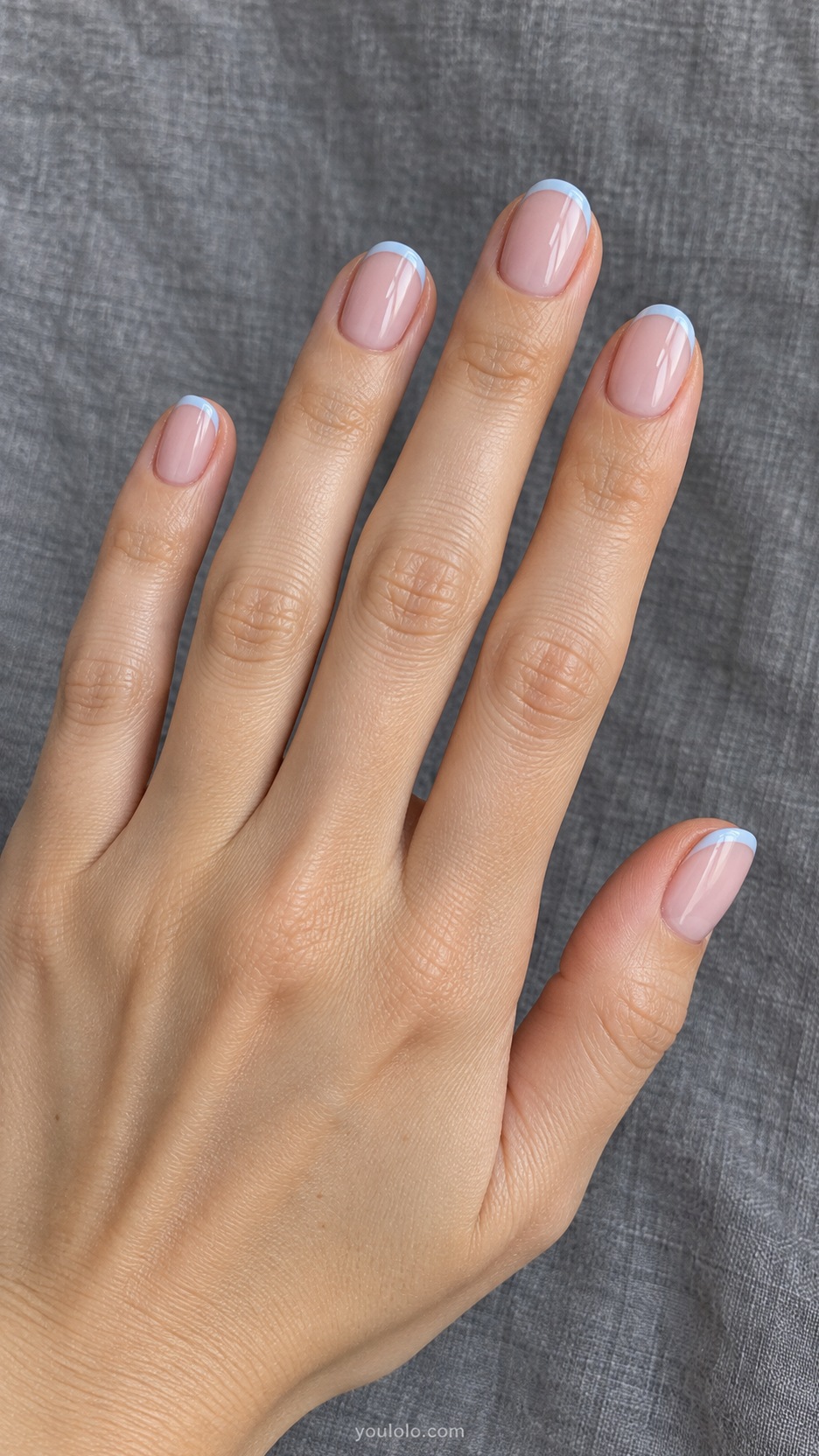 Short Wedding Nails: Something Blue Line manicure on a naturally posed hand