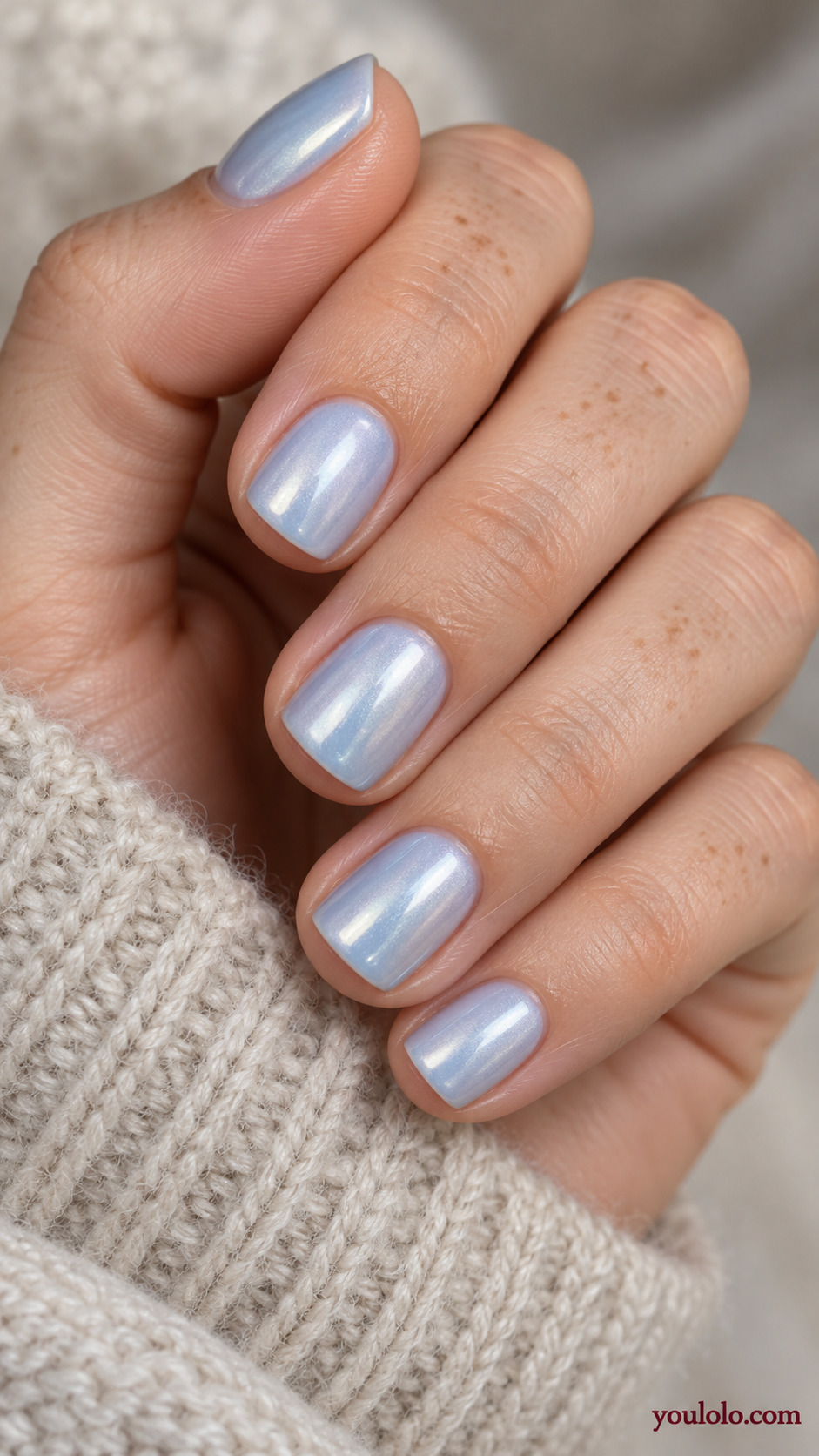 Icy Blue Glazed Short Nails on a naturally gathered feminine hand showing the nail finish