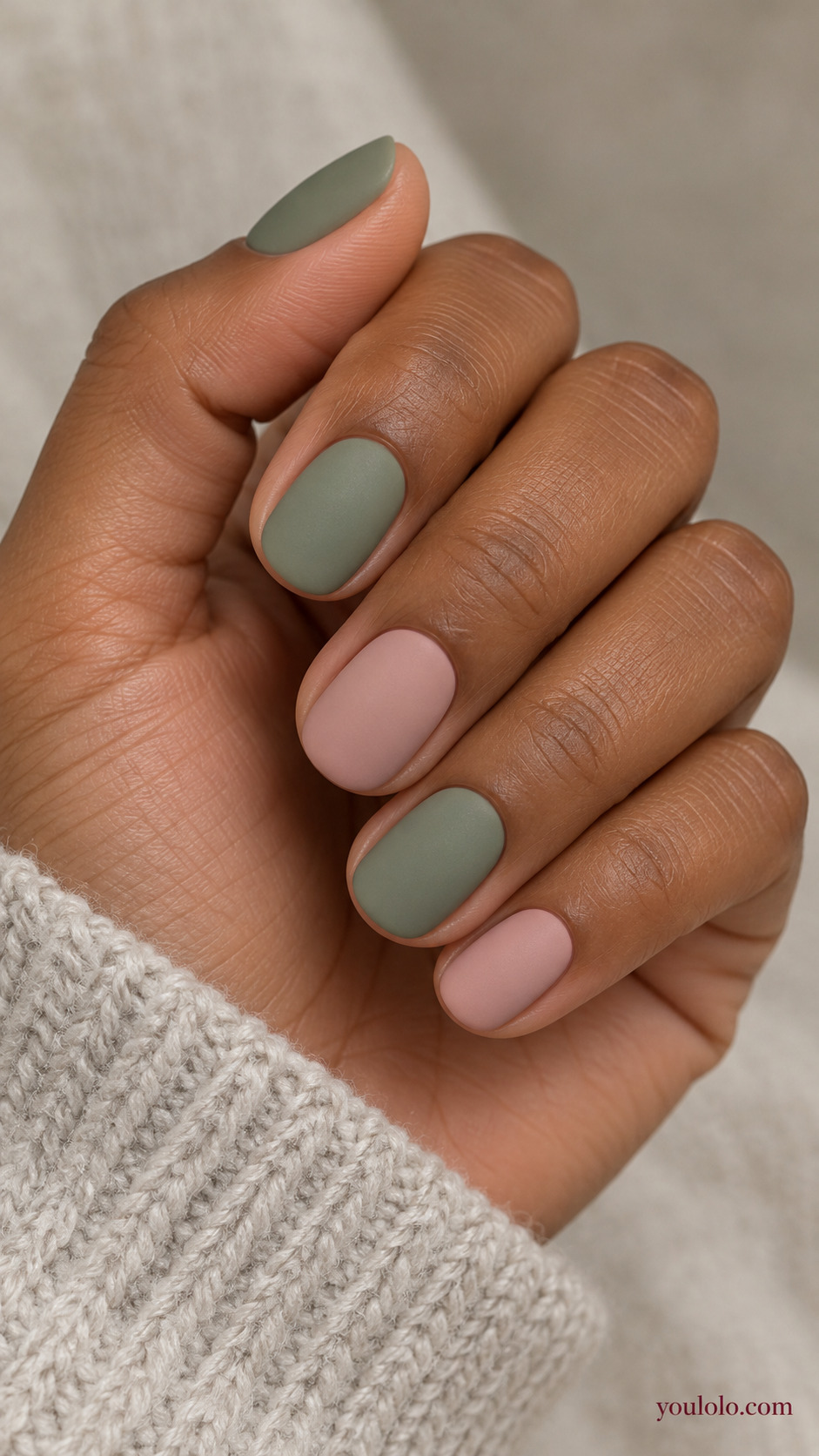 Sage and Blush Color Pairing on a softly gathered feminine hand with a matte green manicure
