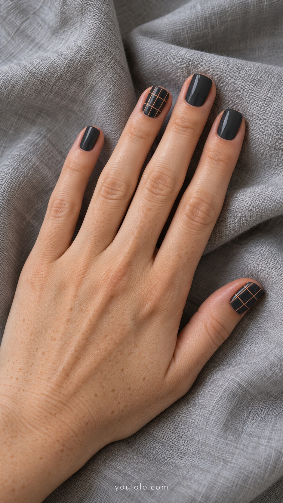 Short square nails charcoal base sparse thin apricot grid on ring and thumb