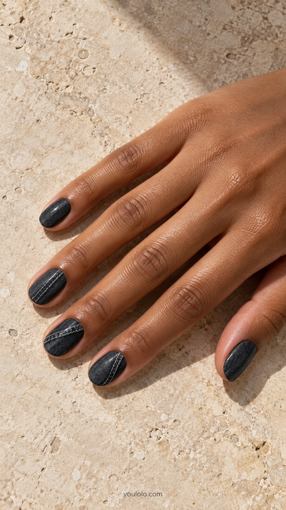Black Denim Wash: short oval charcoal nails, soft washed black denim texture and subtle gray seam on two nails