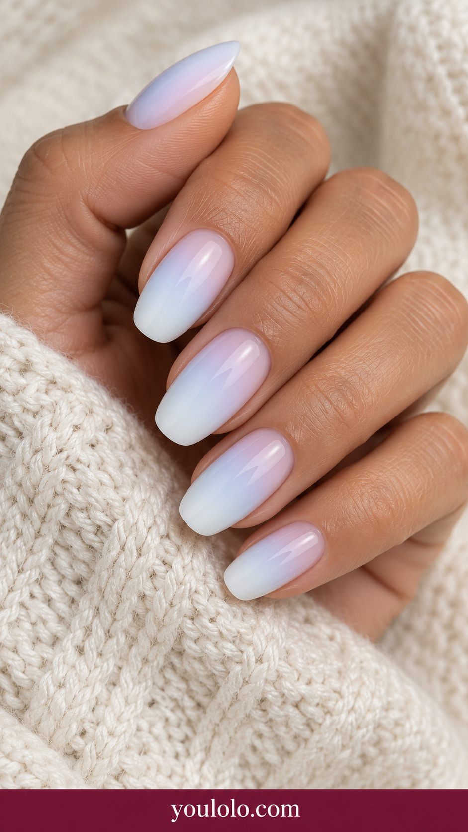 medium squoval milky white nails subtle pale pink and blue opalescent sheen no glitter chunks no art on a naturally relaxed adult hand