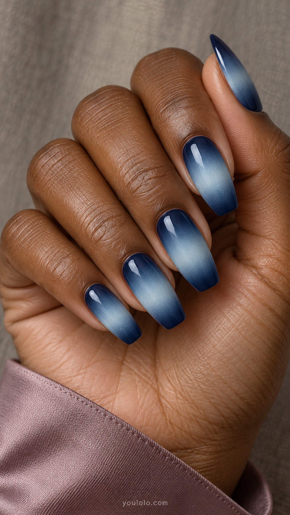 Navy coffin nails fading to icy blue centers and back to dark tips