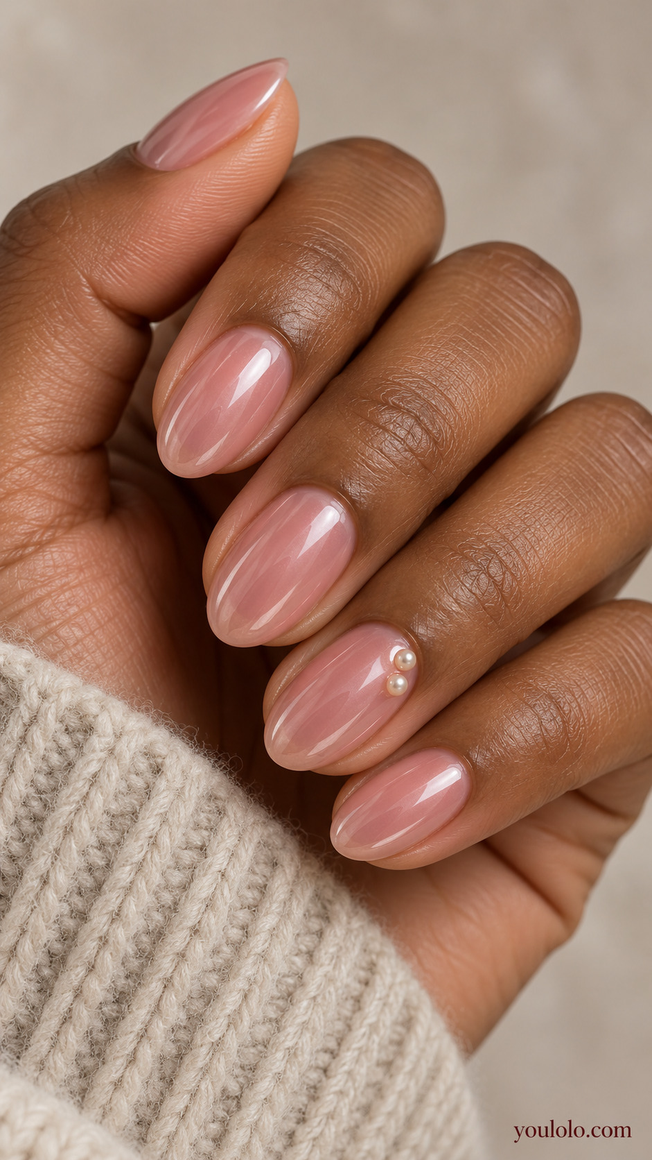 Sheer Rose Glaze with Tiny Pearls on a naturally gathered feminine hand showing the nail finish