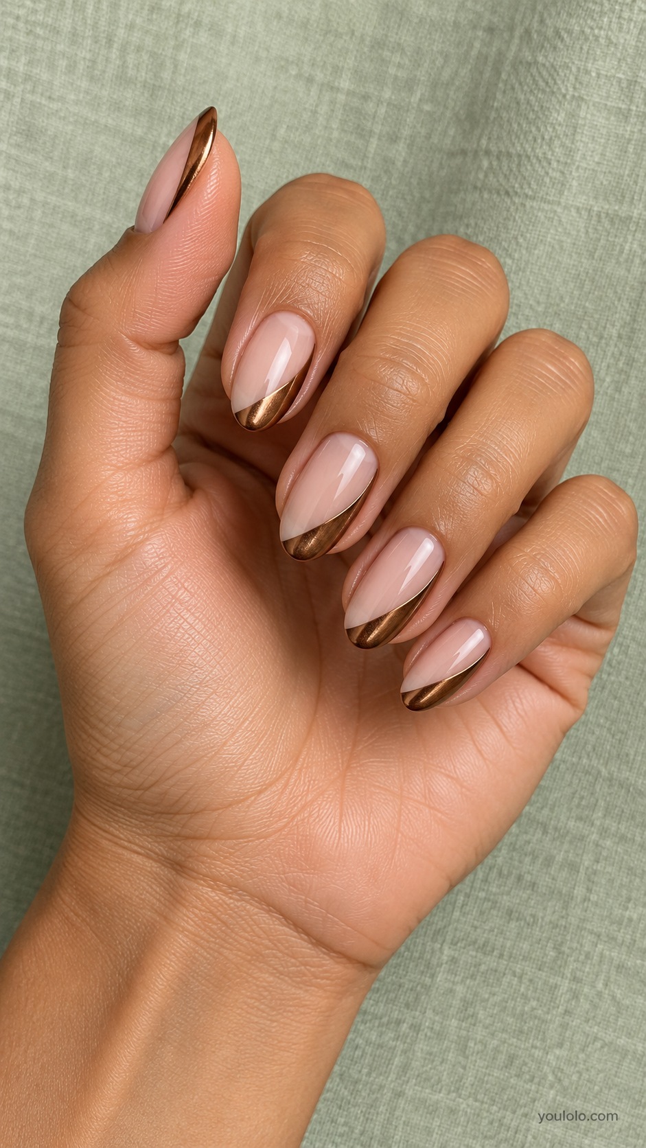 Bronze Side French — medium oval sheer beige base wide asymmetric bronze chrome side French