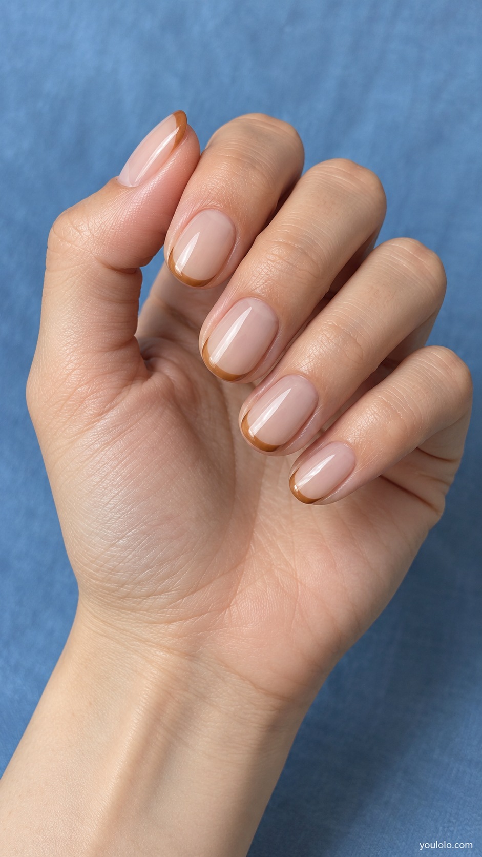 Honey French on Nude — short oval neutral sheer beige base thin honey brown French tips
