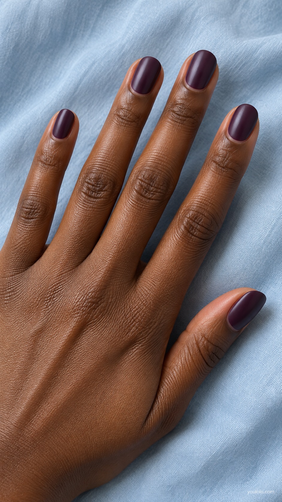 Short oval nails dark aubergine purple satin finish