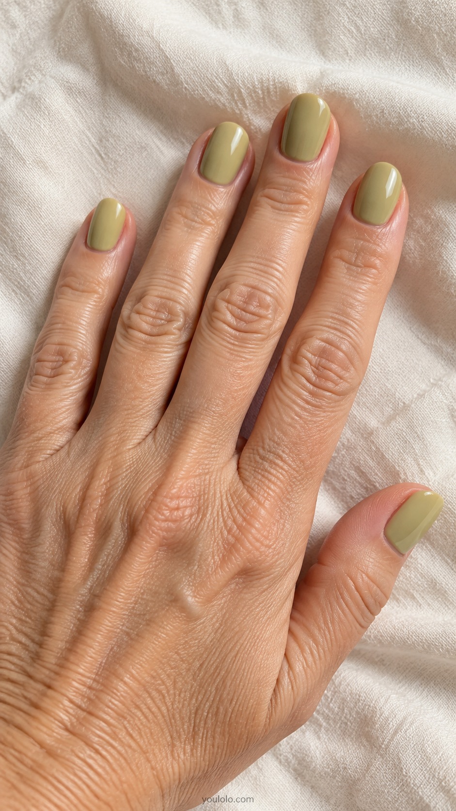 Short oval nails dusty yellow leaning sage green cream gloss