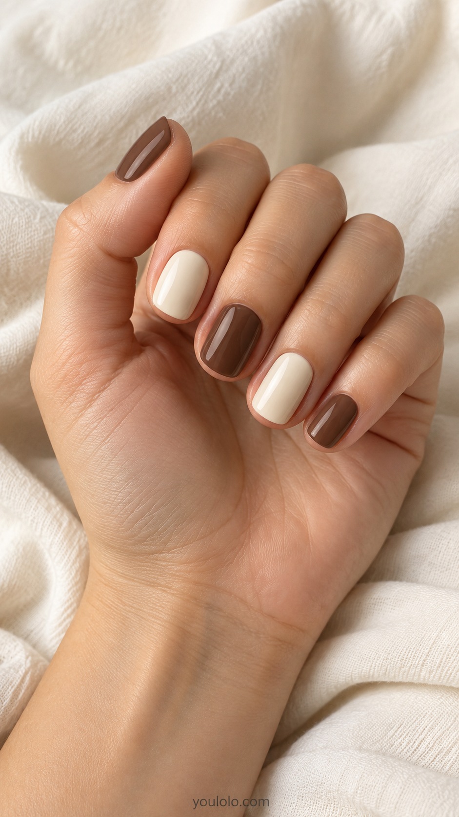 Short squoval nails alternating solid cocoa brown and ivory cream no patterns