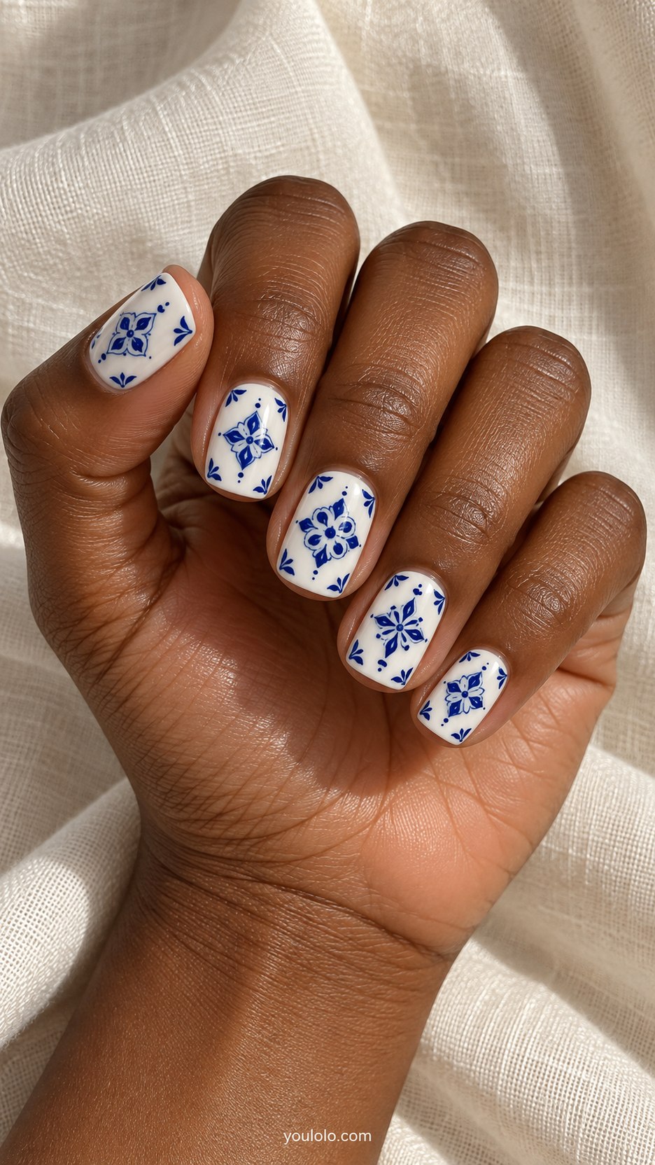 Cobalt Tile Medallions: short squoval white nails, flat cobalt geometric central medallions and fine corner ornaments