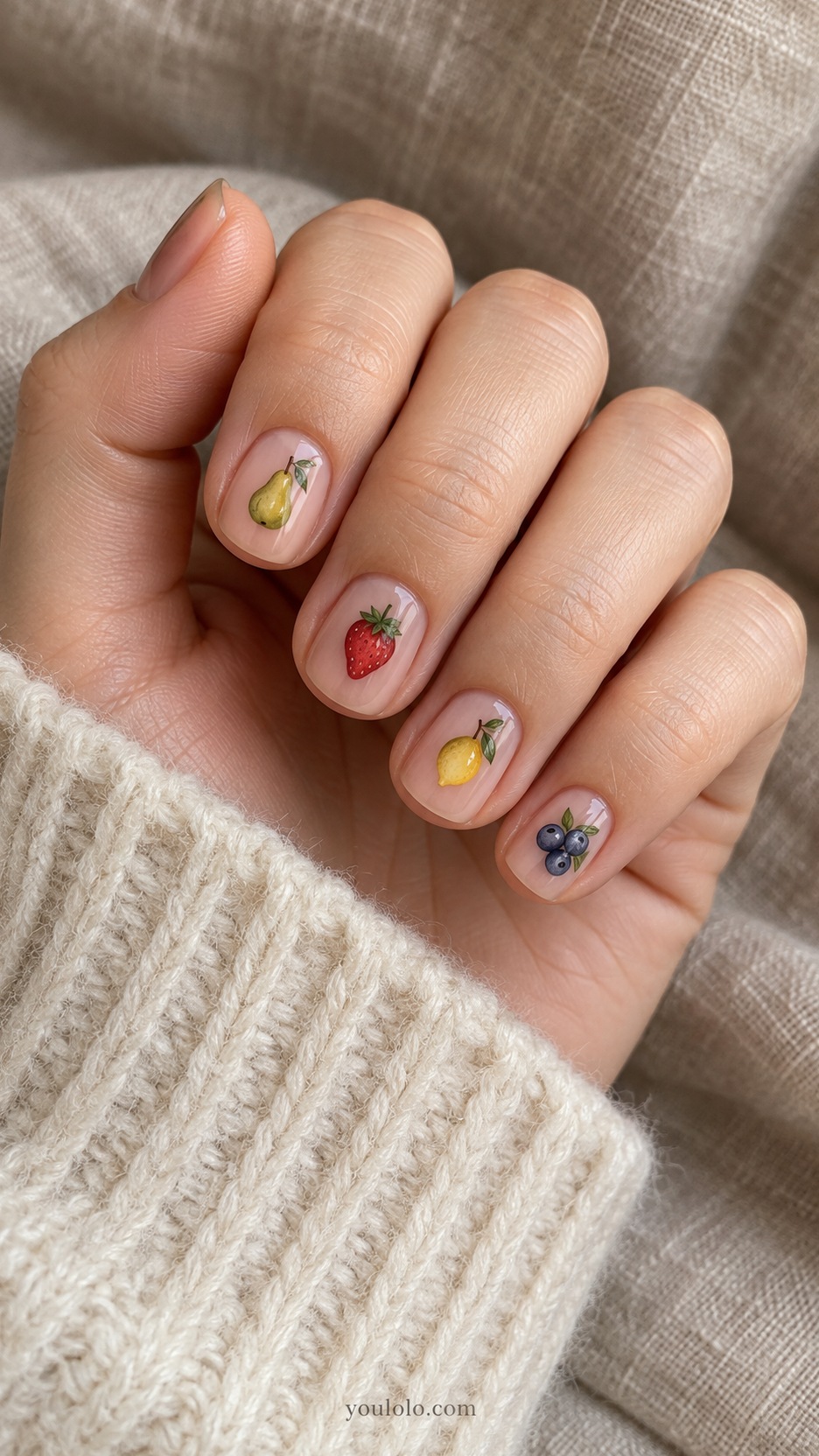 Short Artsy Nails: Mismatched Micro Fruit manicure on a naturally posed hand
