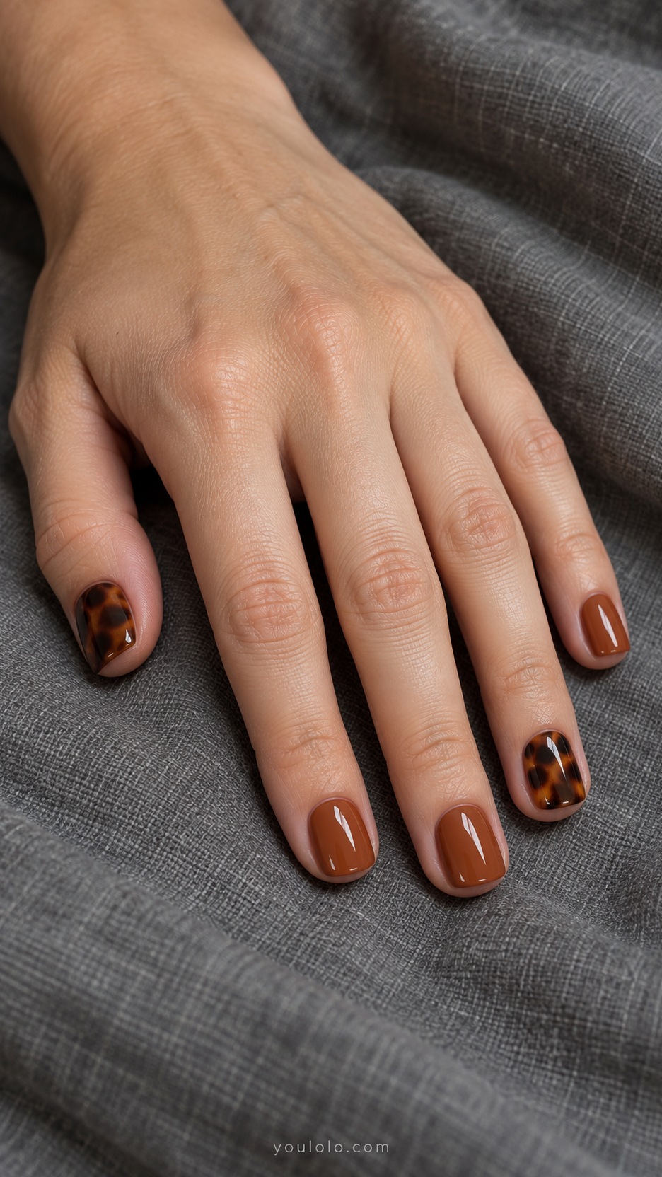 Short Square Nail Designs: Caramel Tortoise Accent manicure on a naturally posed hand