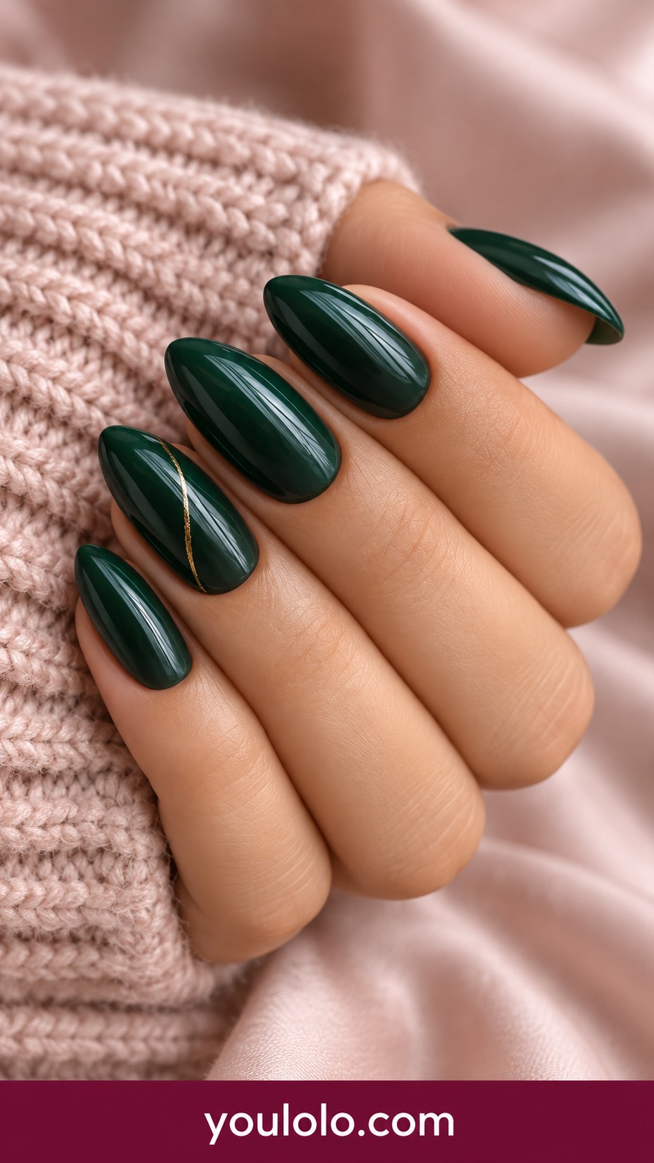 Medium almond forest green glossy nails with one fine gold diagonal thread on accent on a naturally curled young adult hand