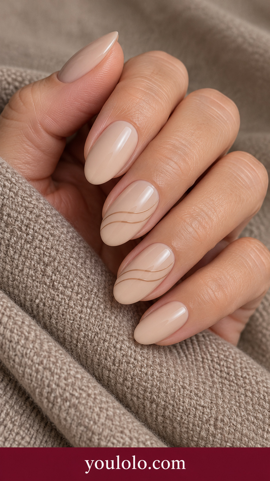 Sand Dune Lines: medium oval warm beige nails two accents two very fine tan flowing horizontal contour lines on a naturally posed adult hand