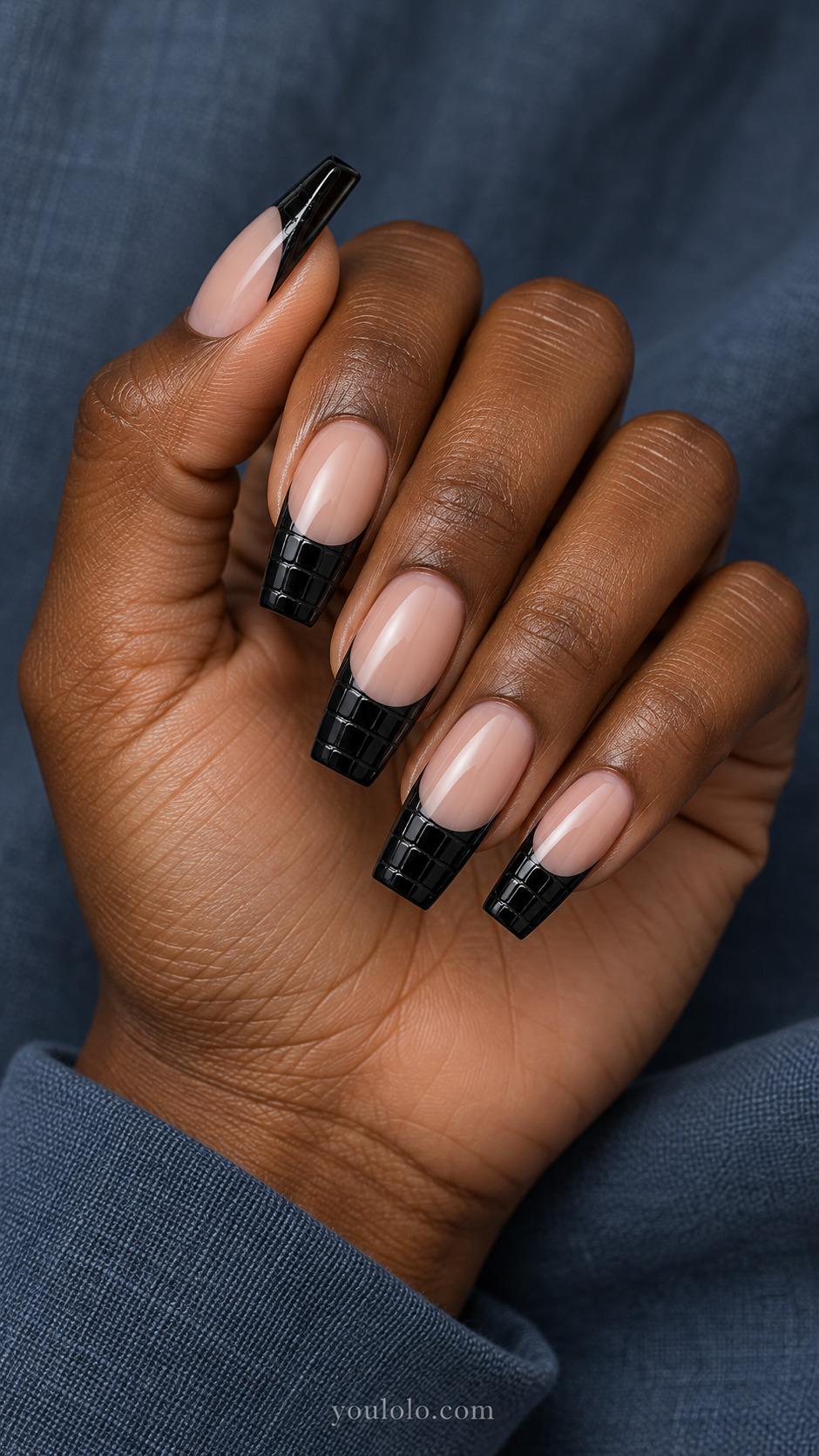 Croc-Embossed Black Tips on coffin nails with a nude base