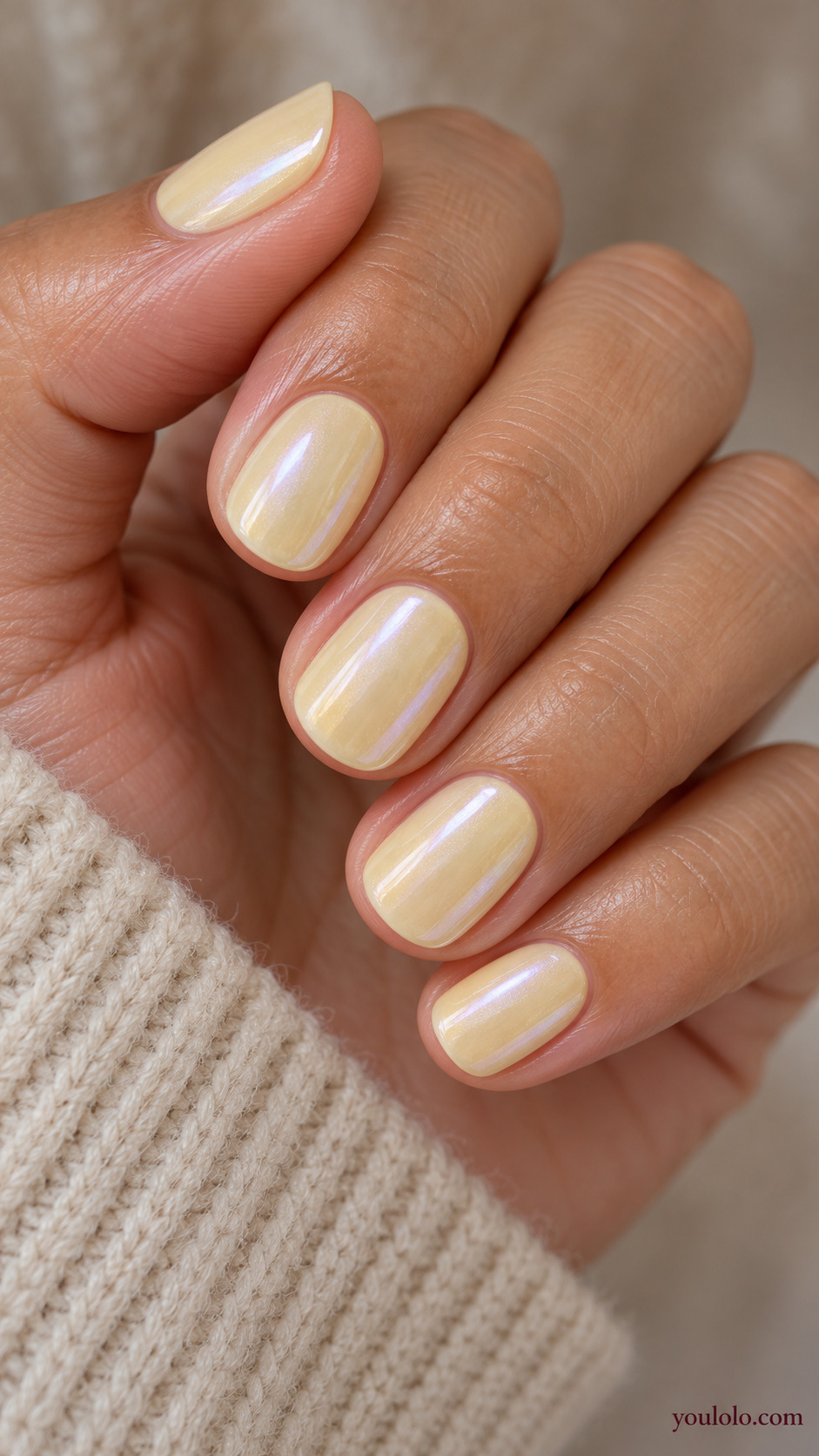 Lemon Cream Glaze on a naturally gathered feminine hand showing the nail finish