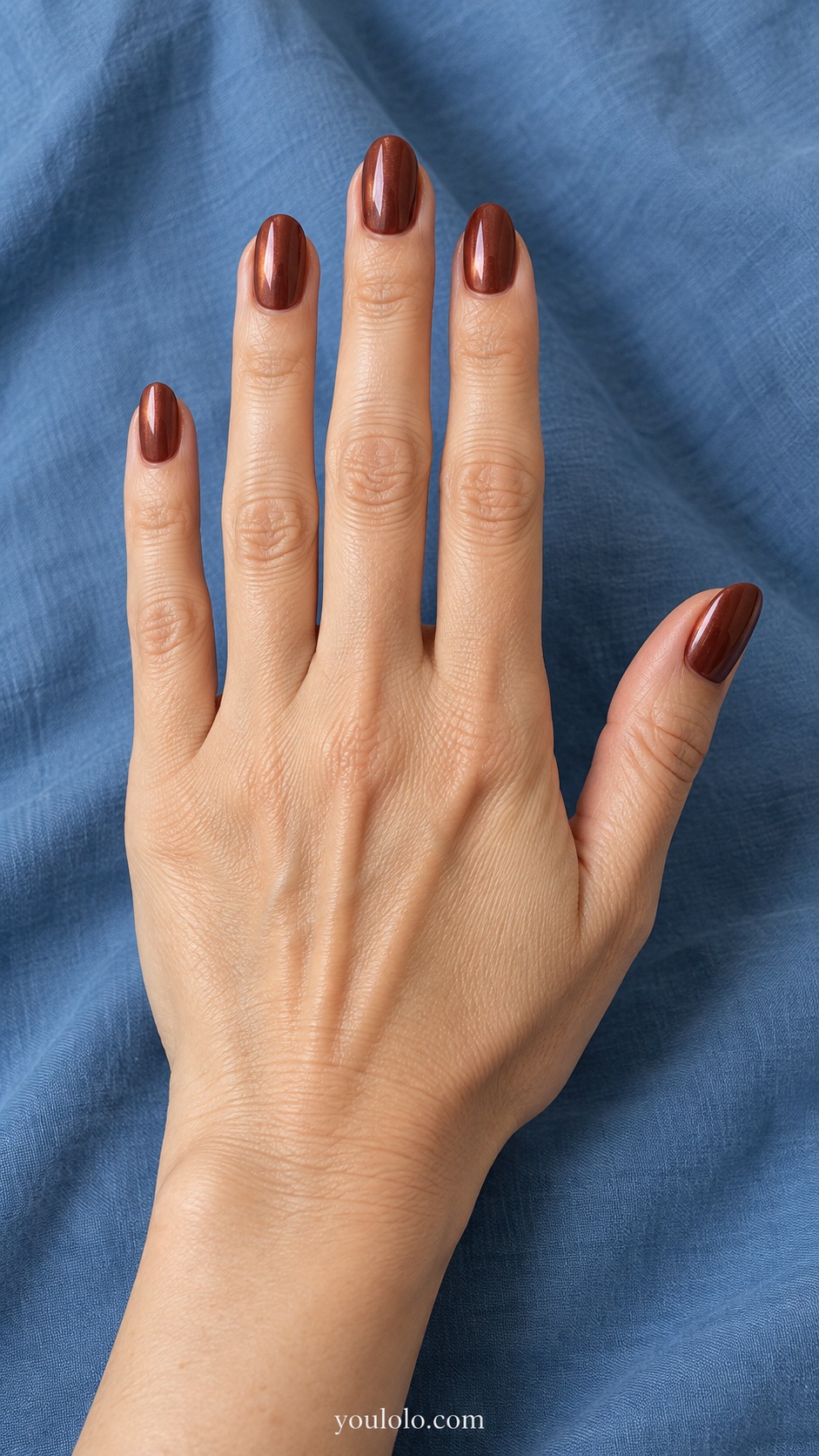Medium oval warm red brown chocolate with fine warm pearl glaze no glitter