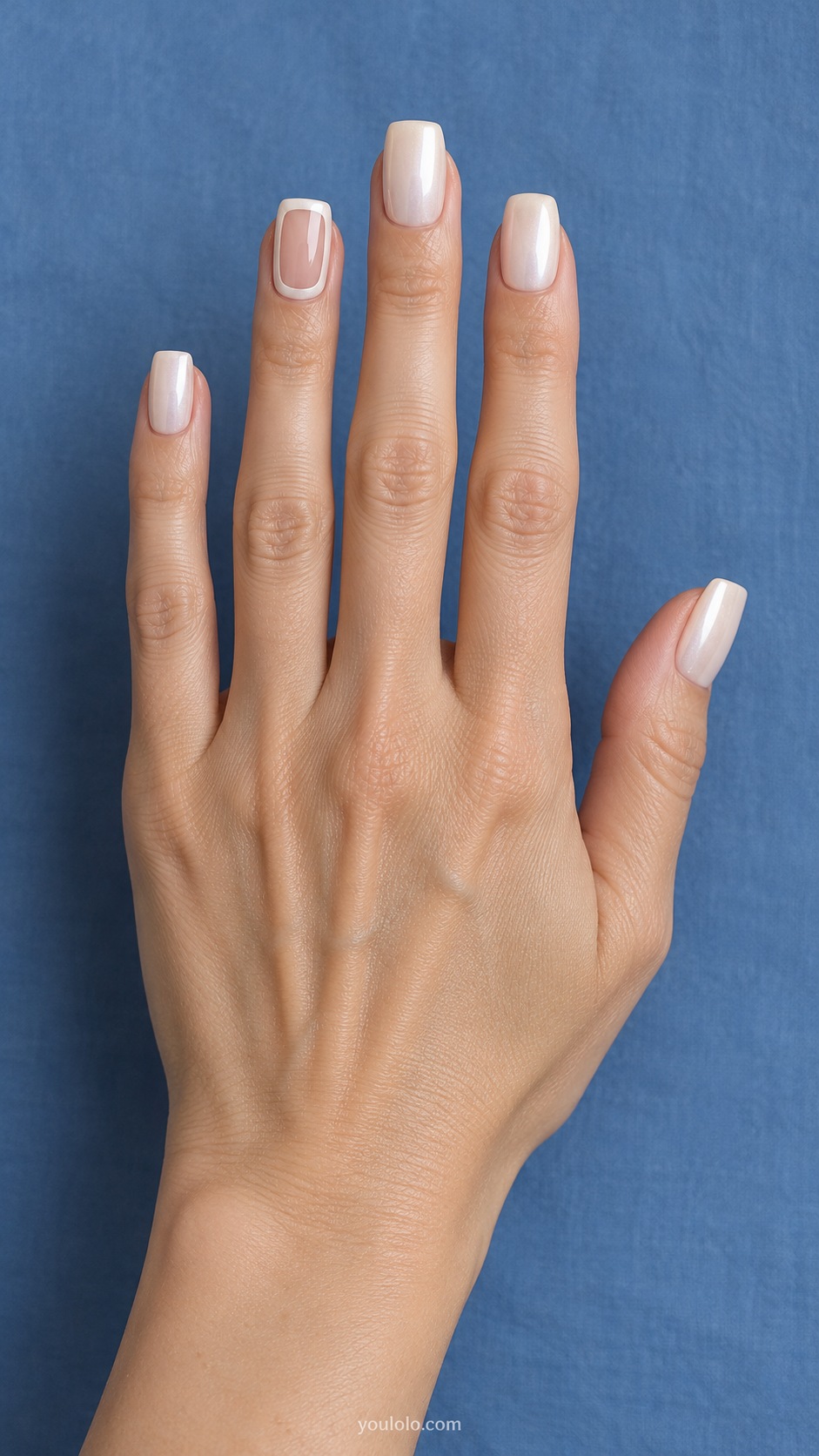 Medium square milky white pearl nails, one accent nail rectangular sheer nude pink center window white pearl border