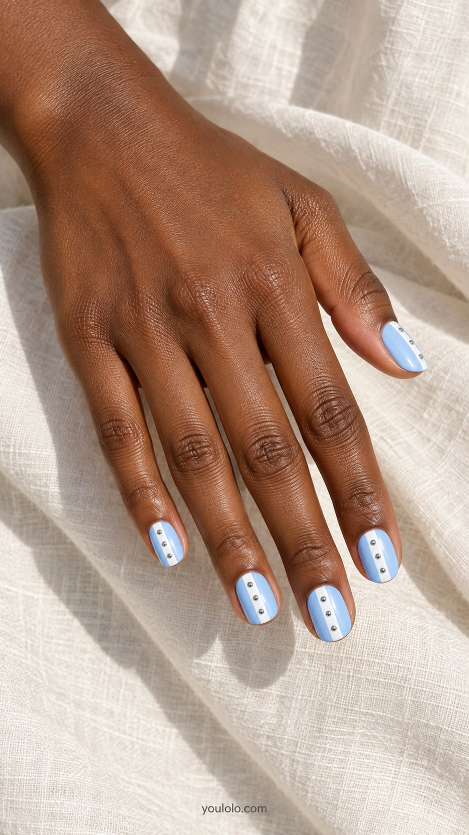 Chambray Button Lines: short rounded pale chambray blue nails, painted white vertical placket with tiny flat silver button dots