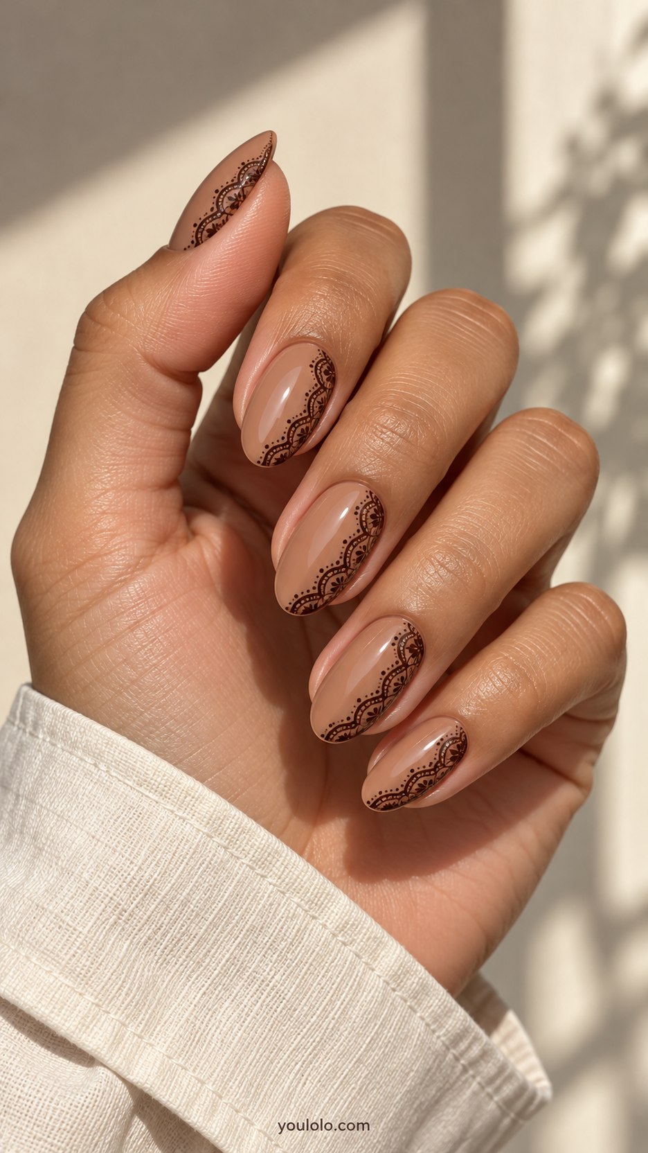 Chocolate Lace Borders: medium almond nude caramel nails, fine dark chocolate scalloped lace along one side