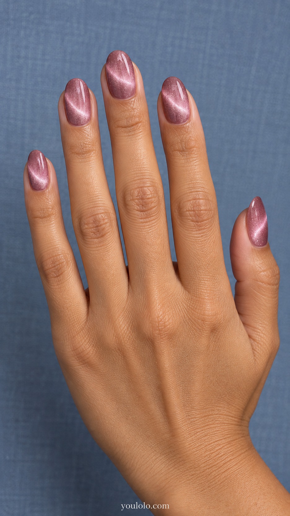 Pink Cat Eye Nails: medium oval dusty mauve pink magnetic nails broad curved crescent light band no painted crescent