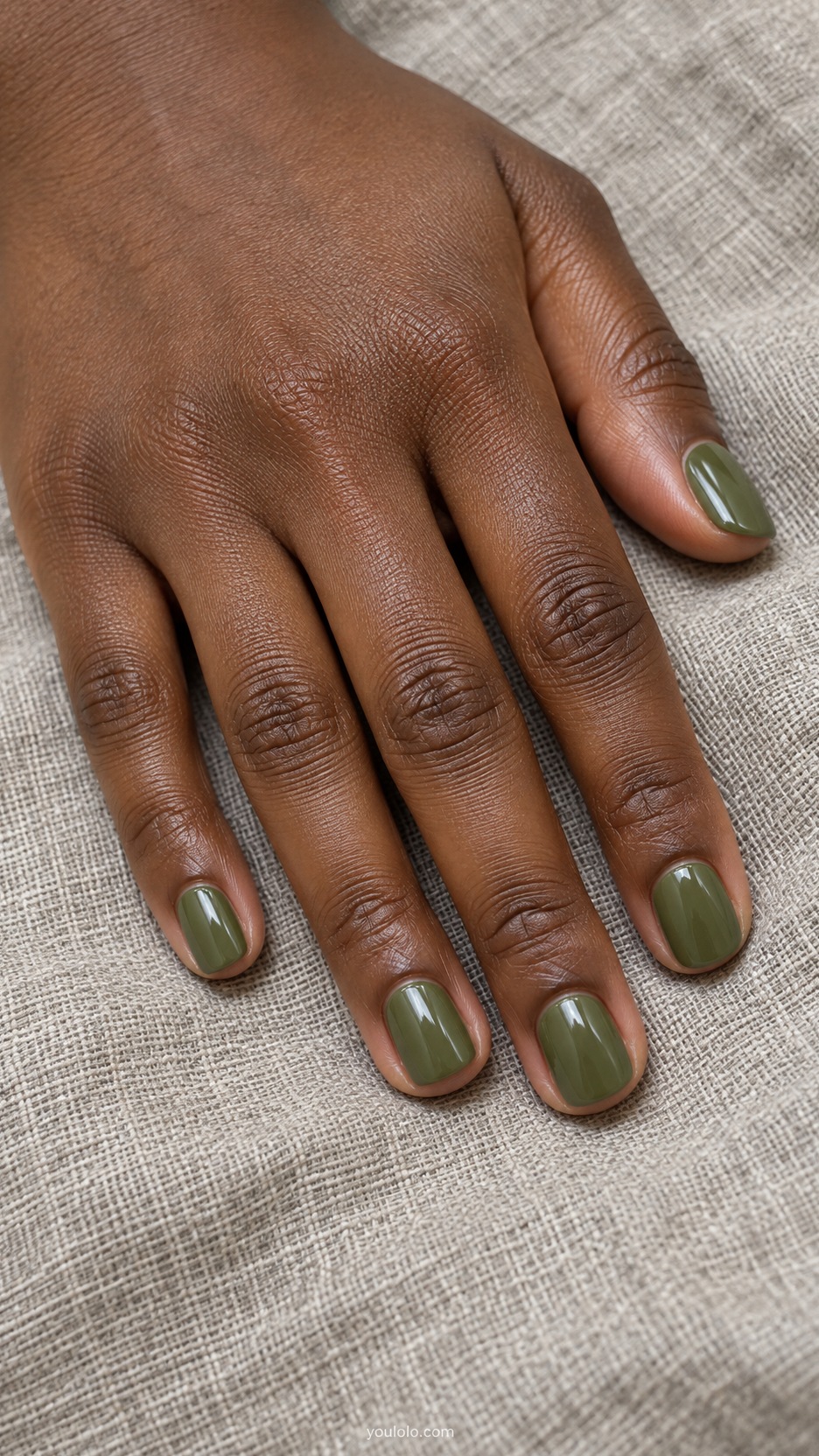 Short Press-On Nails: Olive Minimal Set manicure on a naturally posed hand
