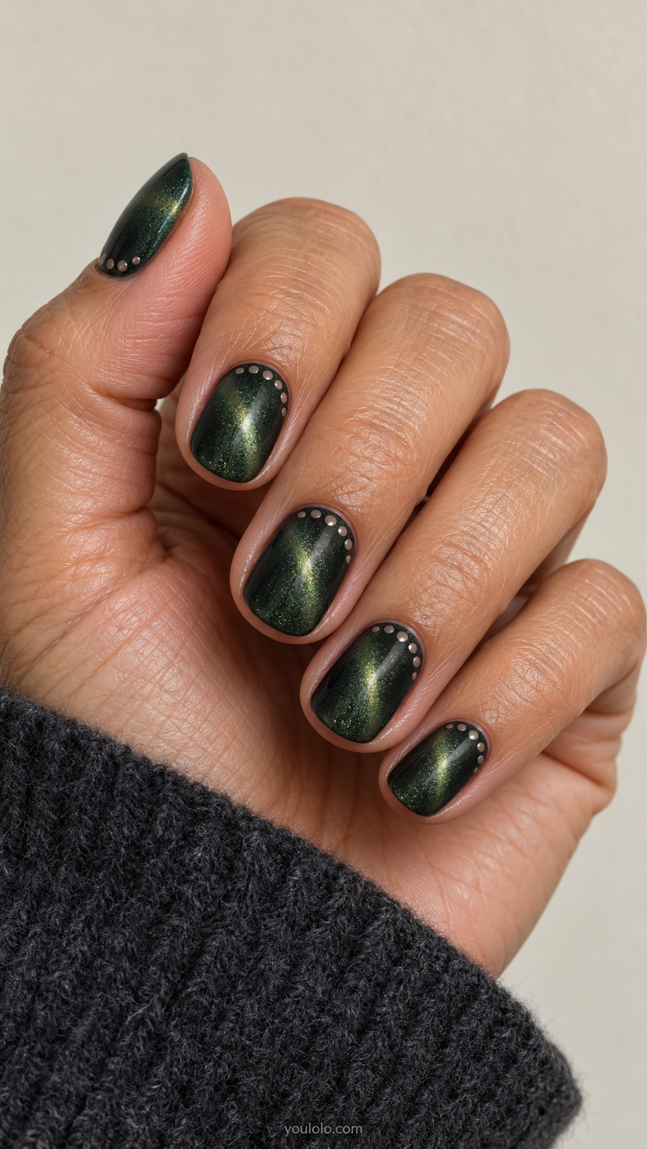 The Dotted Cuticle Crescent manicure on short oval.