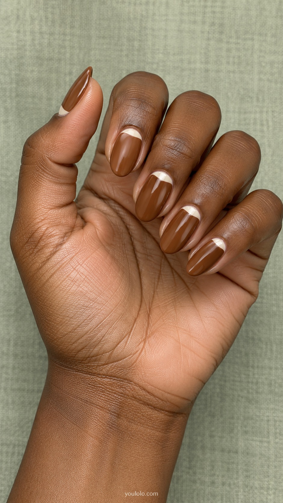 Cream and Caramel Half Moons — medium oval caramel brown nails with ivory small half moons near cuticles