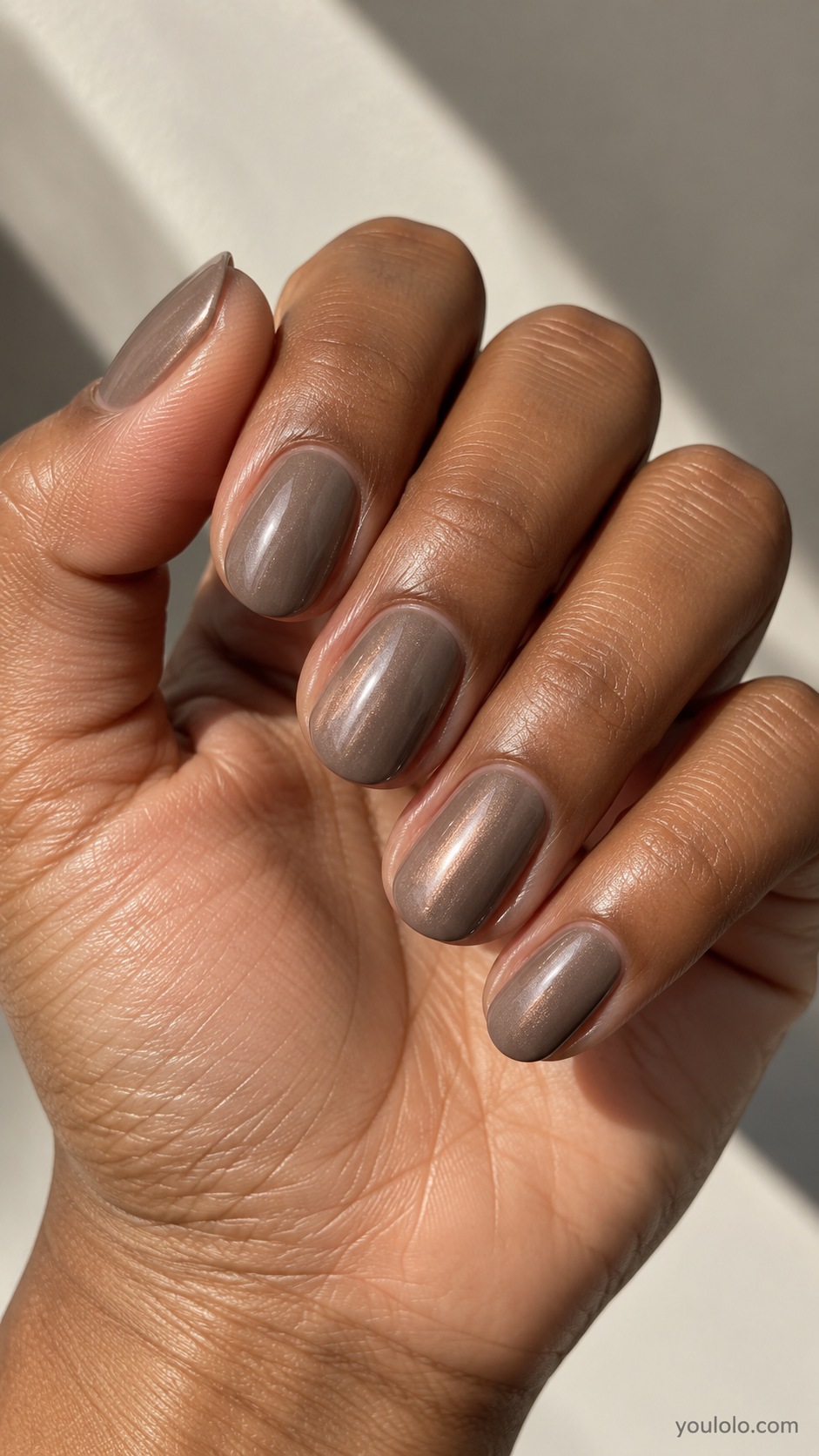 Mushroom Taupe Glaze fall chrome nails — cool mushroom taupe with subtle pearl chrome veil, medium gray beige brown, short oval nails