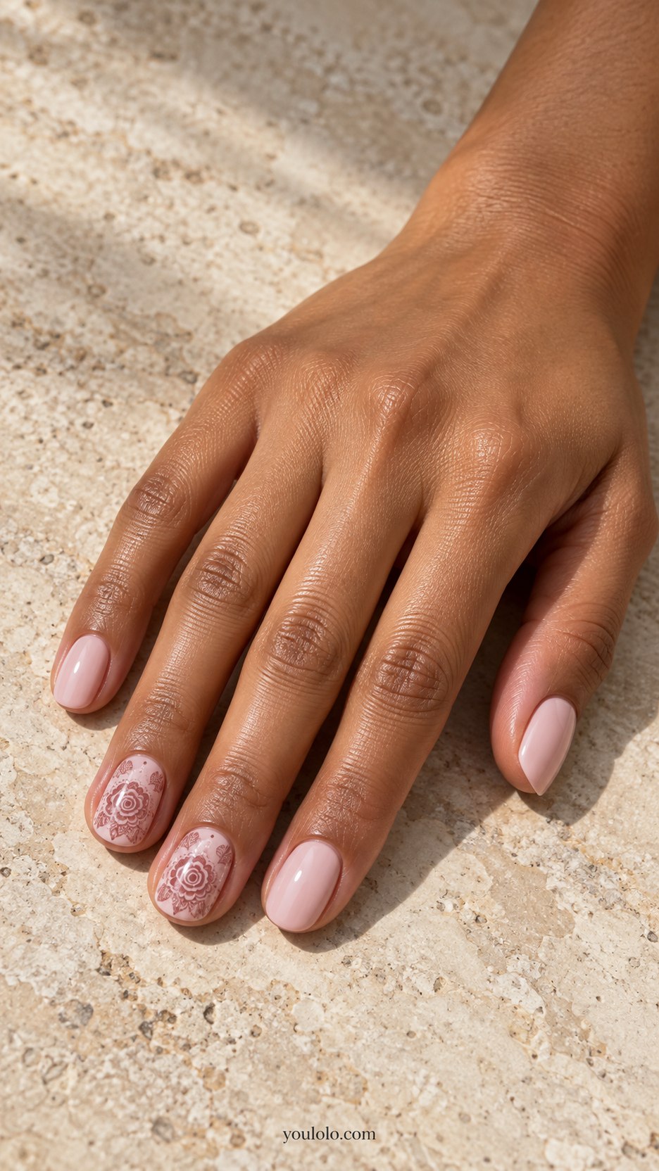 Rose Lace Medallions: short oval pale pink nails, muted rose lace circular rosette on two accent nails