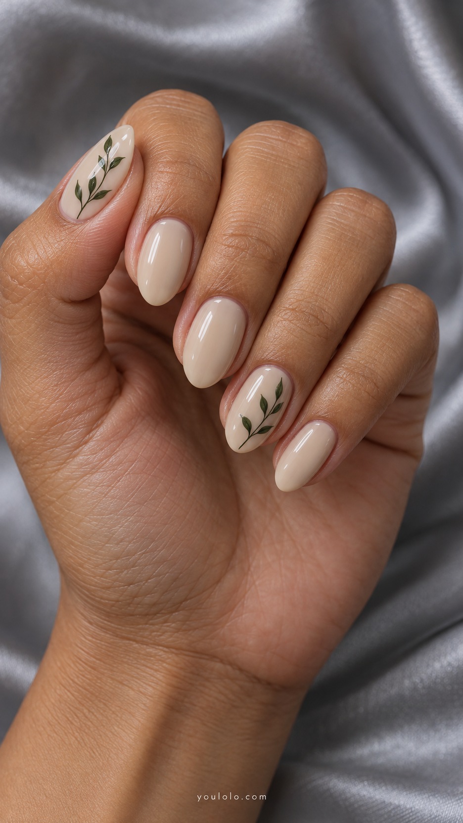 Short Almond Nail Designs: Moss Botanical Pair manicure on a naturally posed hand