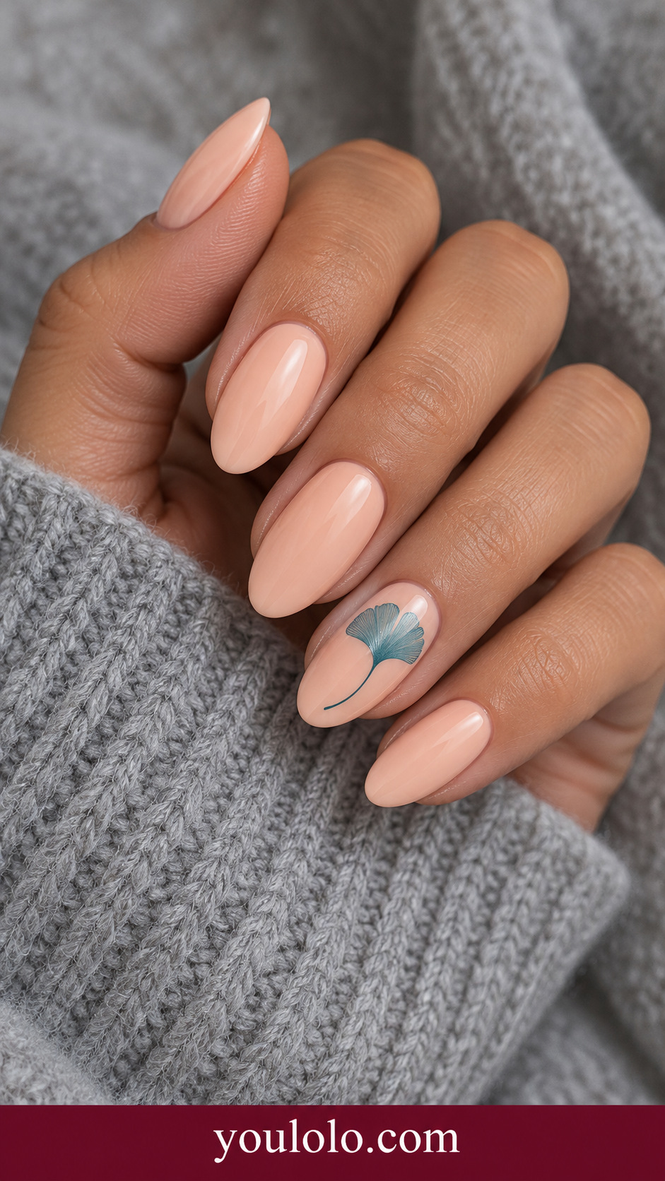 Peach Picnic Ginkgo: medium oval peach cream nails one accent fine teal ginkgo fan leaf outline, no repeated botanicals on other nails on a naturally posed adult hand