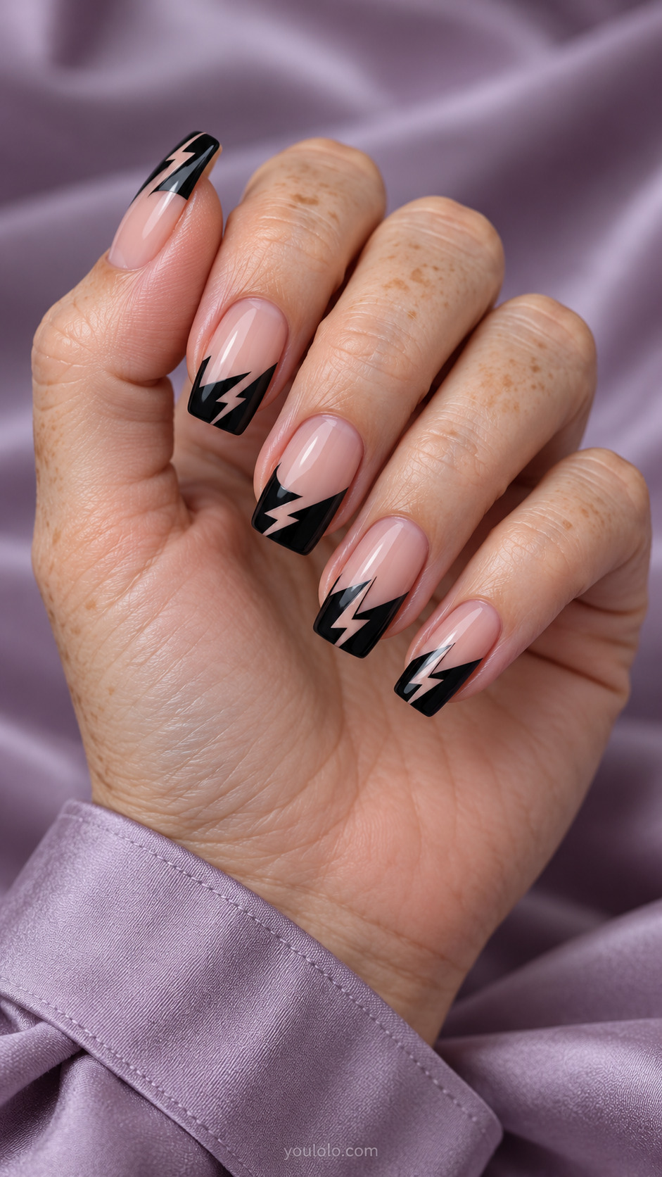 Negative-Space Lightning Tips on tapered square nails with a nude base