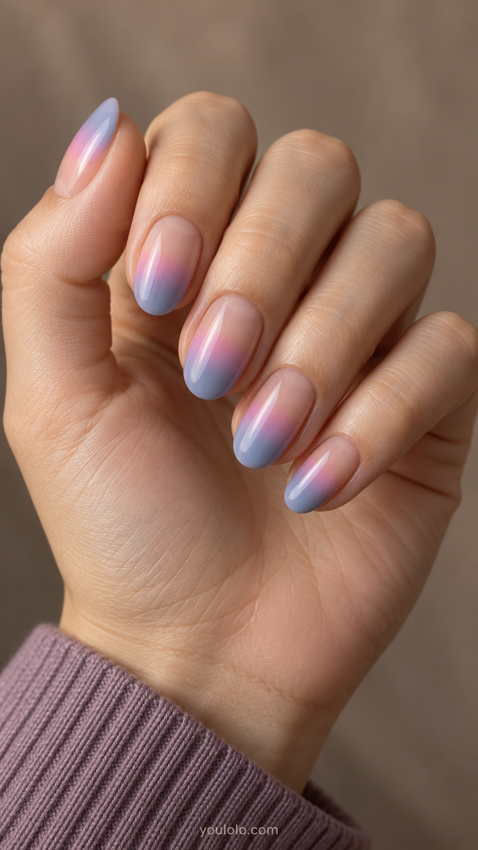 Nude oval nails with blush, lilac and blue blended tips