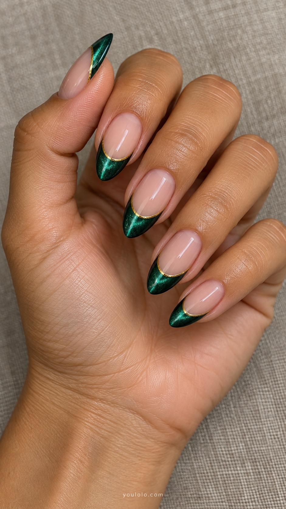Emerald French with a Gold Border cat eye nails — Medium almond nude nails emerald magnetic French tips bordered at smile line with hairline gold.