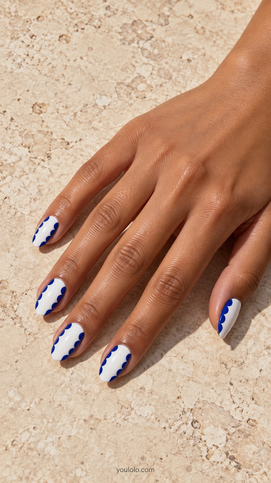 Blue Scalloped Borders: medium oval white nails, cobalt scalloped border down sides with white center