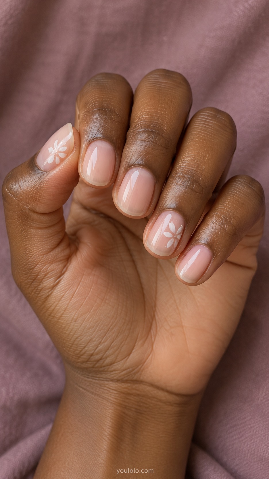 Short Wedding Nails: White Petal Pair manicure on a naturally posed hand