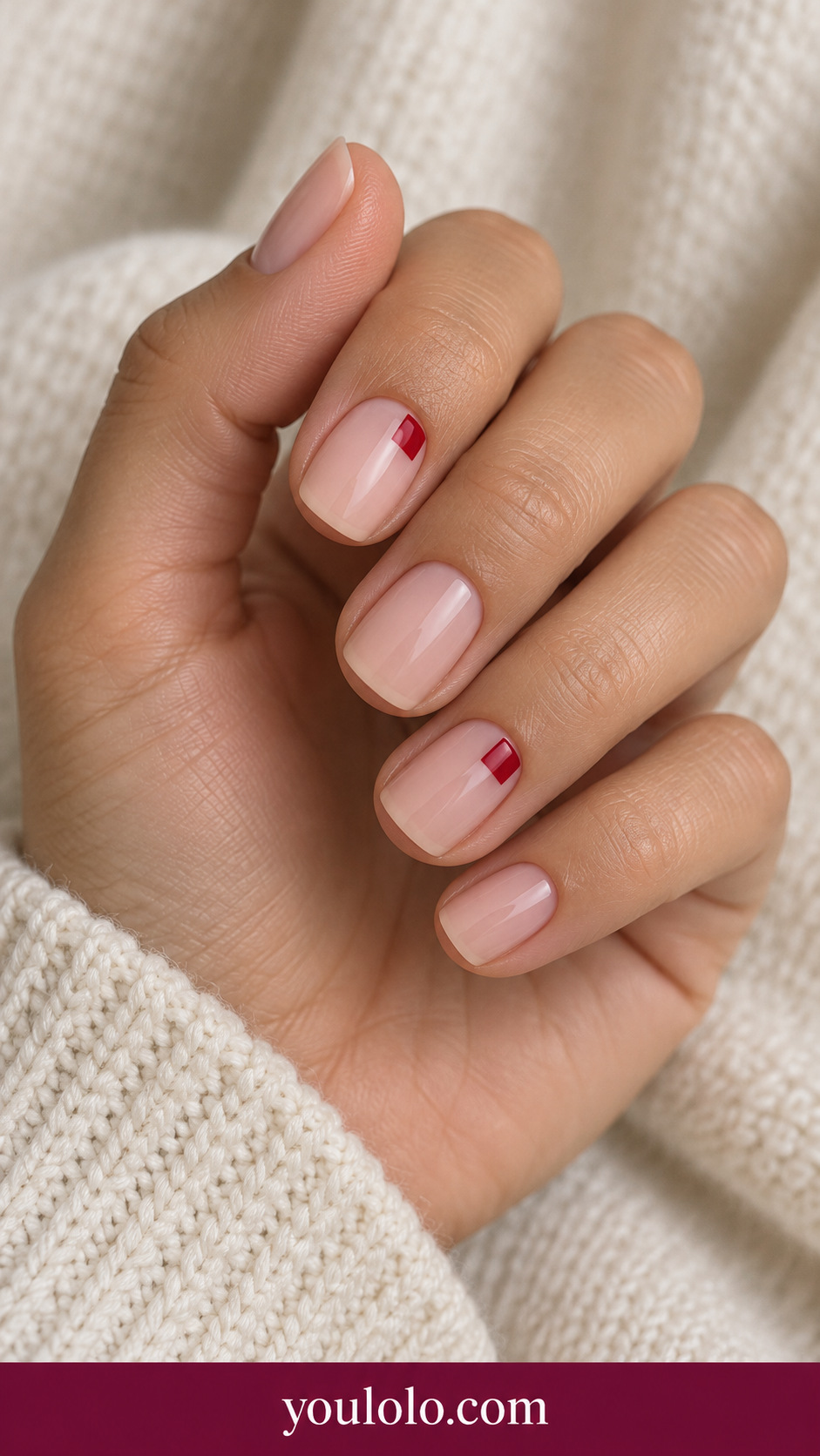 Red Corner Tile: short soft square sheer pink nails small solid cherry red square in upper outer corner on two nails on a naturally posed adult hand