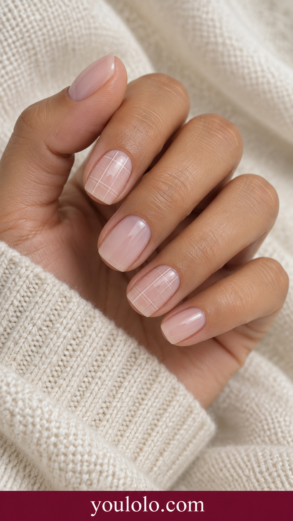 Sheer Pink Fine Check: short square sheer blush nails index and ring extremely fine pale white open check lines, remaining sheer blush on a naturally posed adult hand