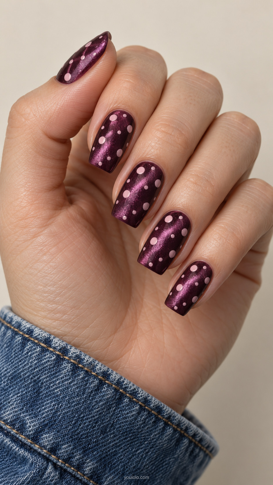 Two Sizes, One Clean Grid manicure on medium tapered square.