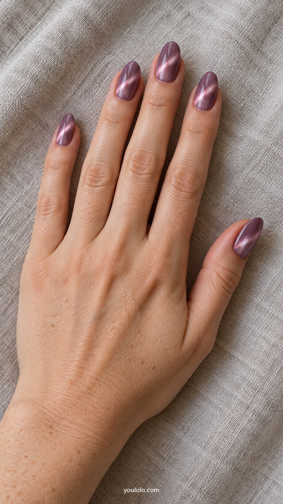Medium almond nails mauve magnetic gel one diagonal luminous pink silver band each nail