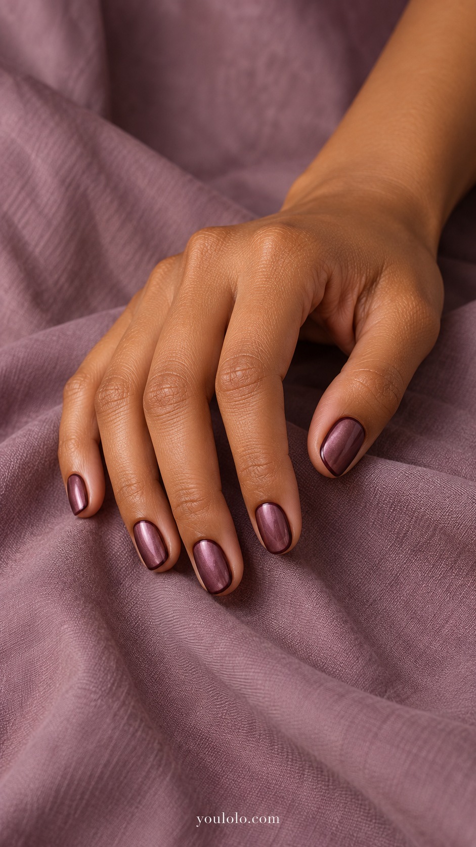 Short oval muted purple burgundy pearl nails fine darker plum outline inside perimeter