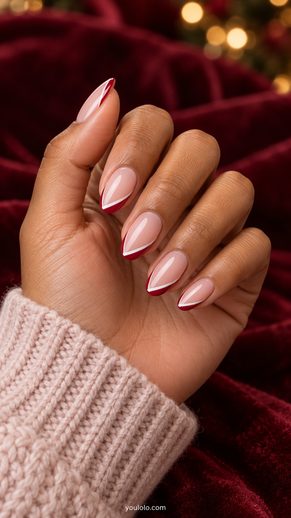 Medium oval sheer pink nails narrow red tip edge with a fine white diagonal accent and open pink base