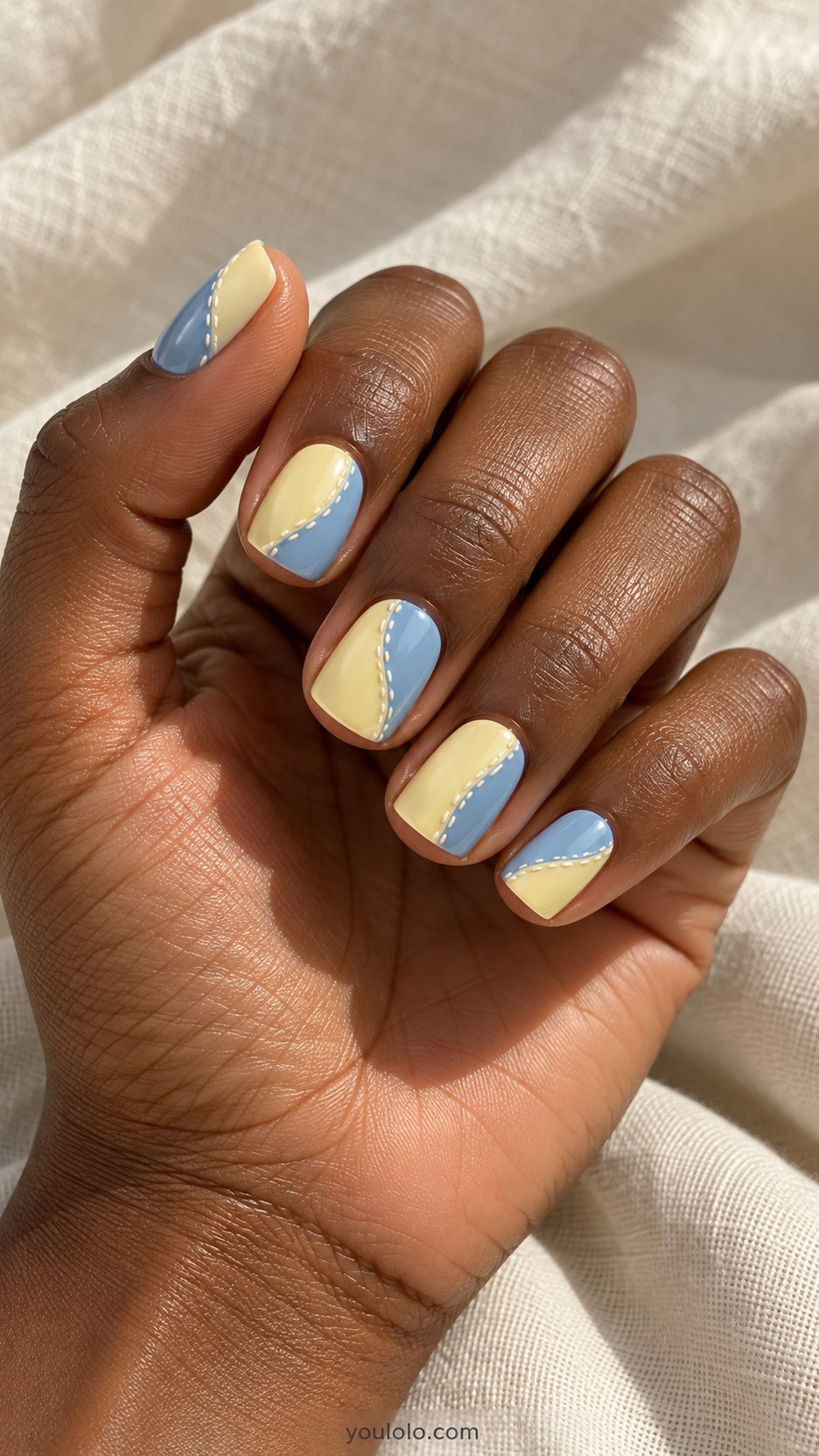 Denim-and-Butter Blocks: short square nails, pale butter yellow and washed blue panels joined by fine cream stitched border