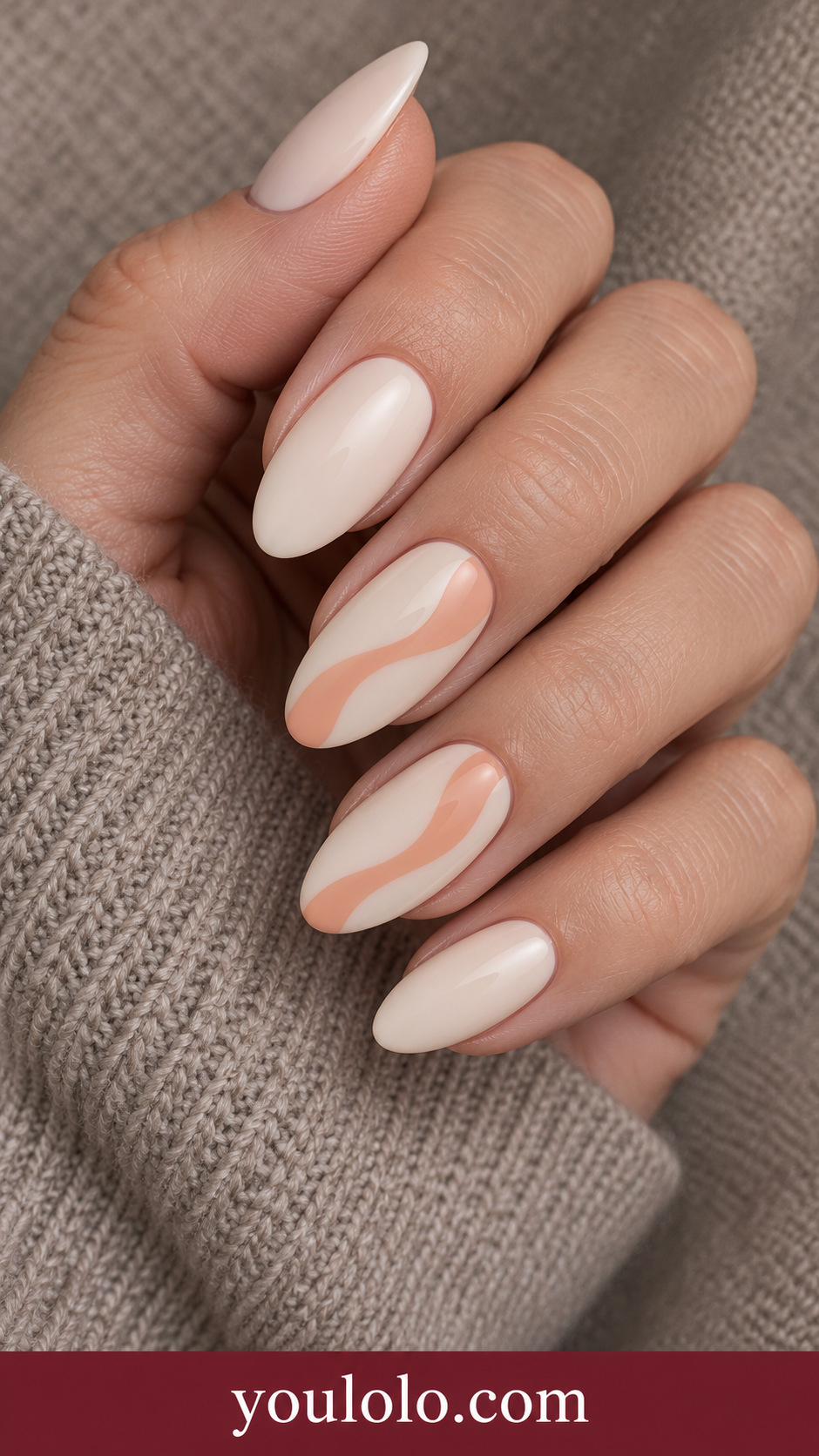 Creamsicle Swirl: medium almond pale cream nails two accents broad flat apricot soft flowing swirl, no marbling on a naturally posed adult hand