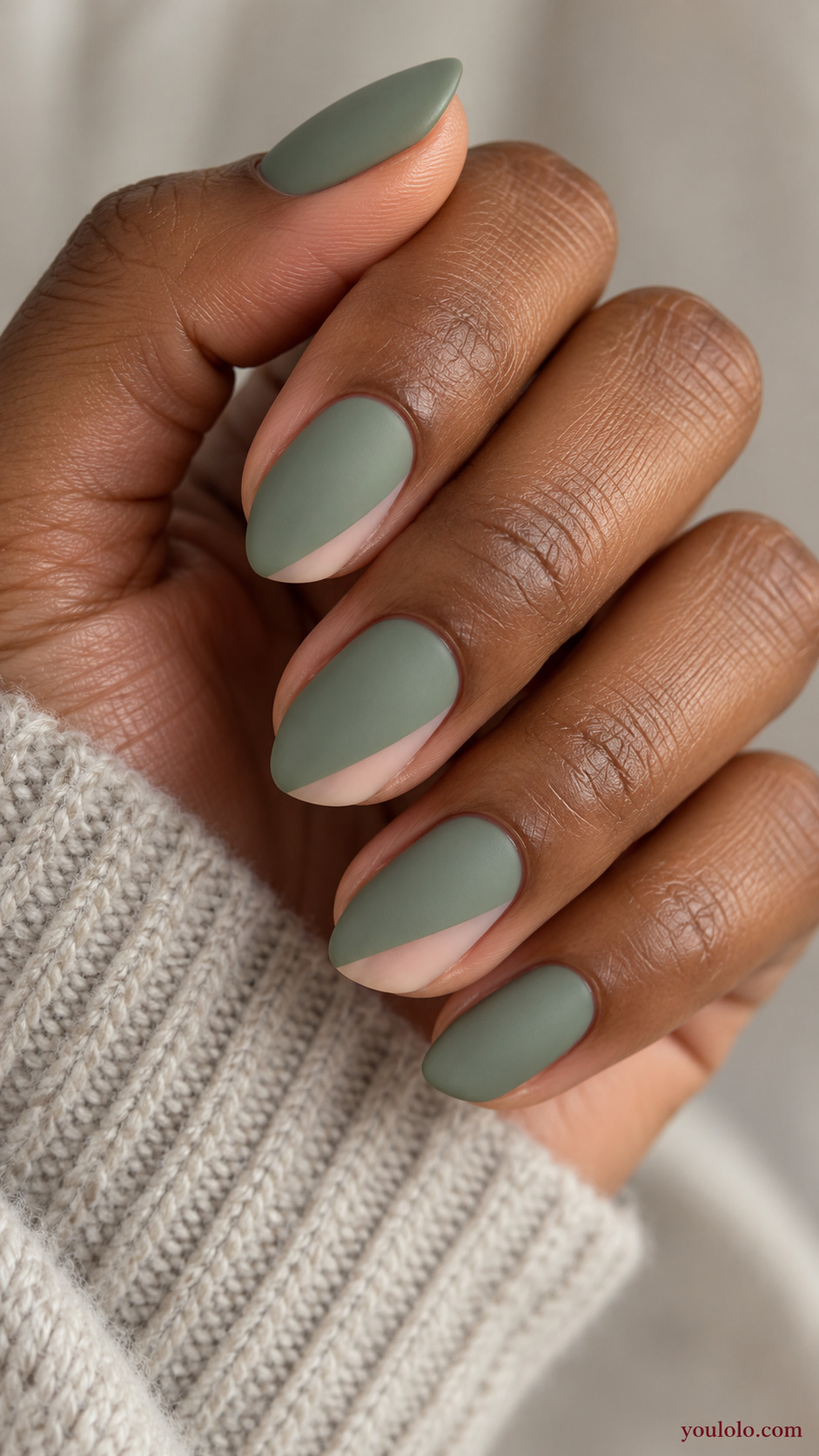 Sage and Nude Diagonal Windows on a softly gathered feminine hand with a matte green manicure