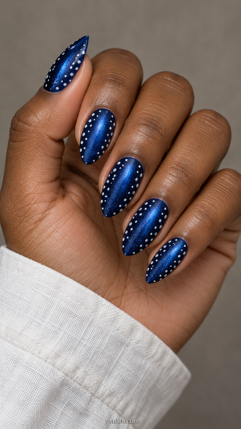 The Dot-Free Racing Stripe manicure on medium almond.