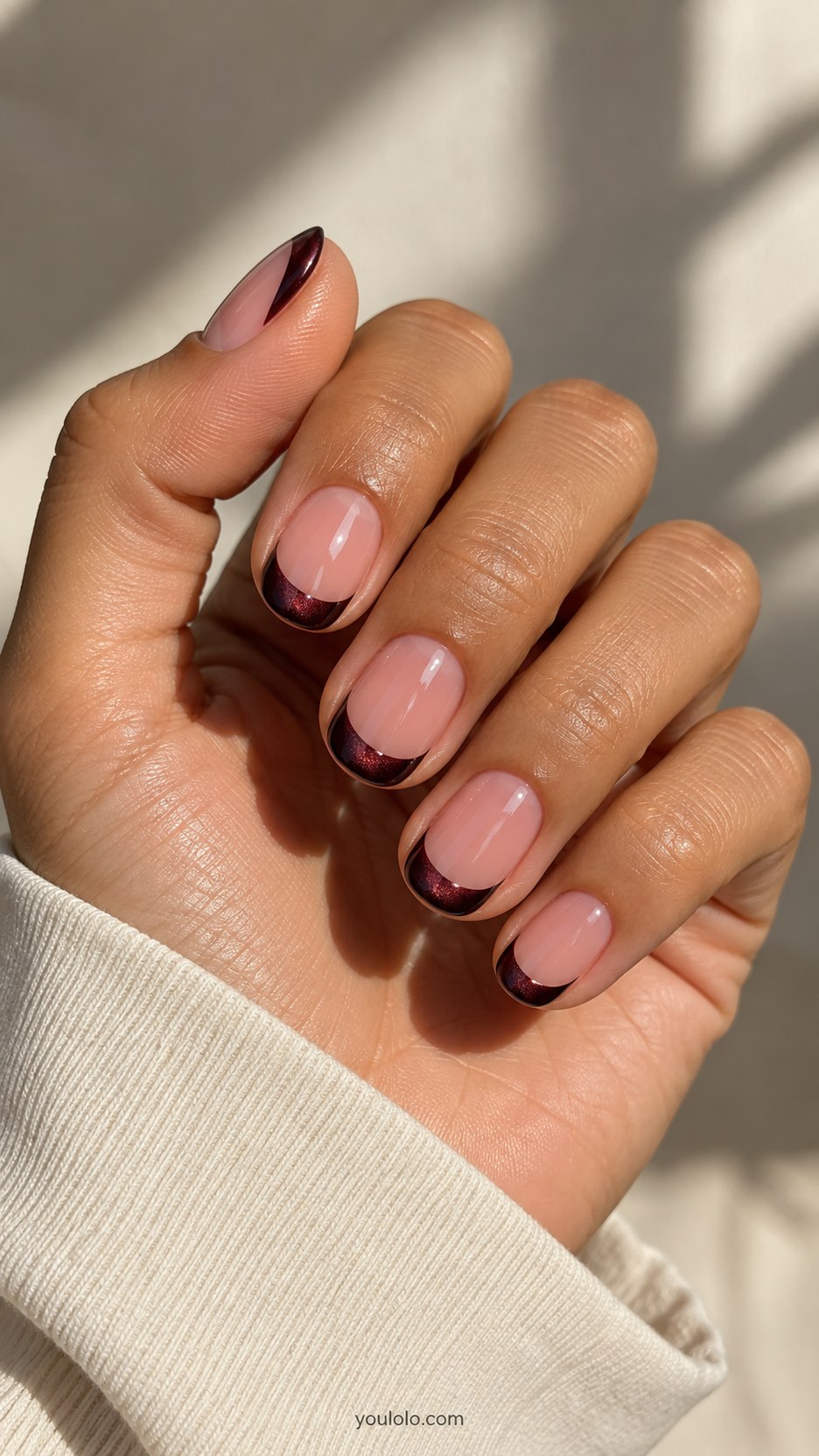 Black Cherry Velvet Tips: short oval sheer pink nails, small rounded black cherry magnetic velvet French tips