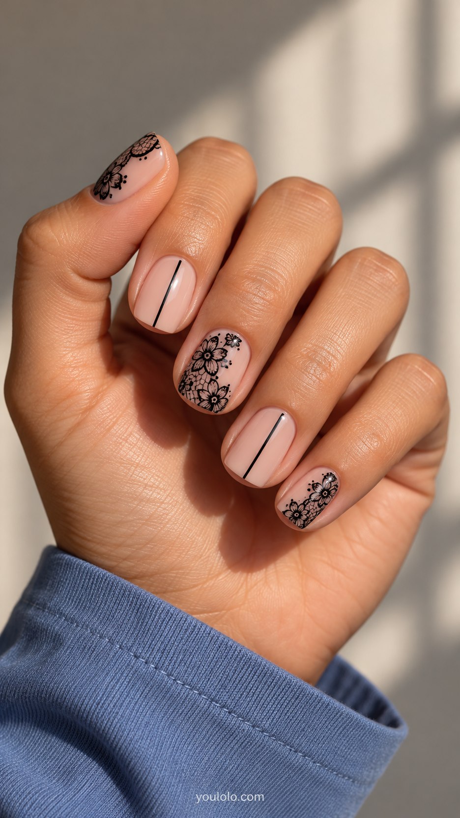Lace-and-Pinstripe Contrast: short square nude nails, alternating black lace detail and one fine black vertical stripe