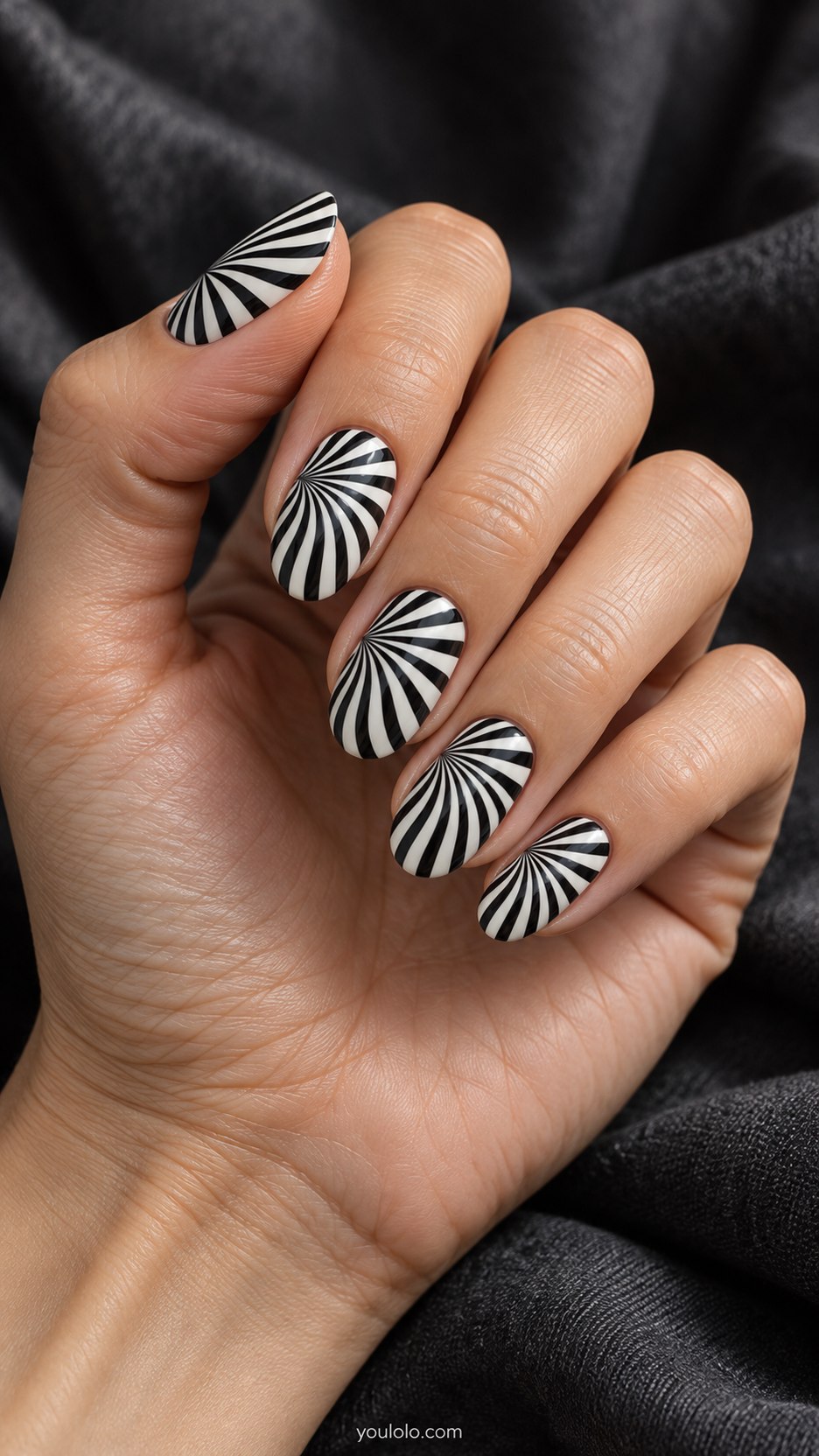 Op-Art Radiating Lines: medium oval nails, black fine rays widening from off-center point on white base making apparent wave